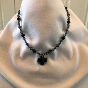 Matching earrings, bracelet and necklace, blue and black and dark metal